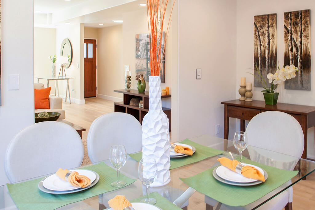 Dining room with pops of orange and green